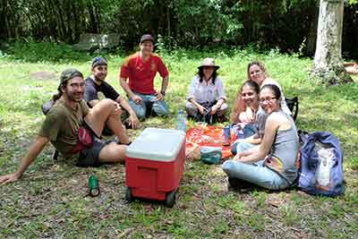 With no concessions in the park and the nearest restaurant miles away, smart visitors, like this group, bring their own food. These picnickers found a dry spot right off Janes Scenic Drive.